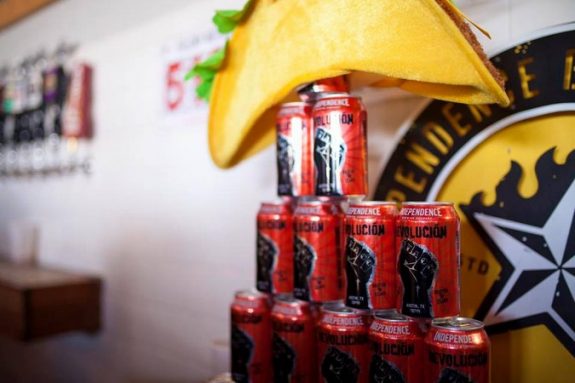 Revolucion Independence Brewing cans